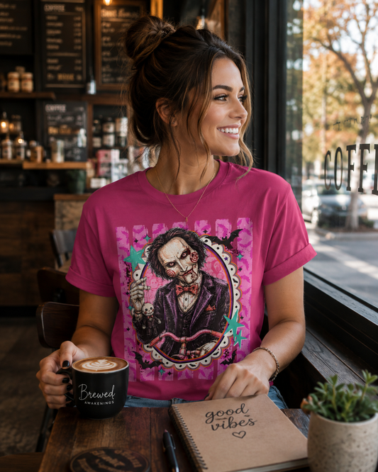 Saw Puppet Graphic Tee — Retro Pink Horror Movie T-Shirt